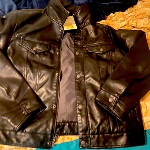 Medium size leather Levi’s jacket. Never worn. Tag still attached.